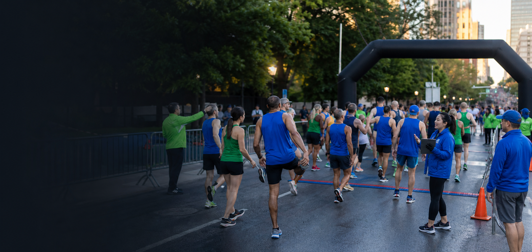 Runners and event staff at a race start