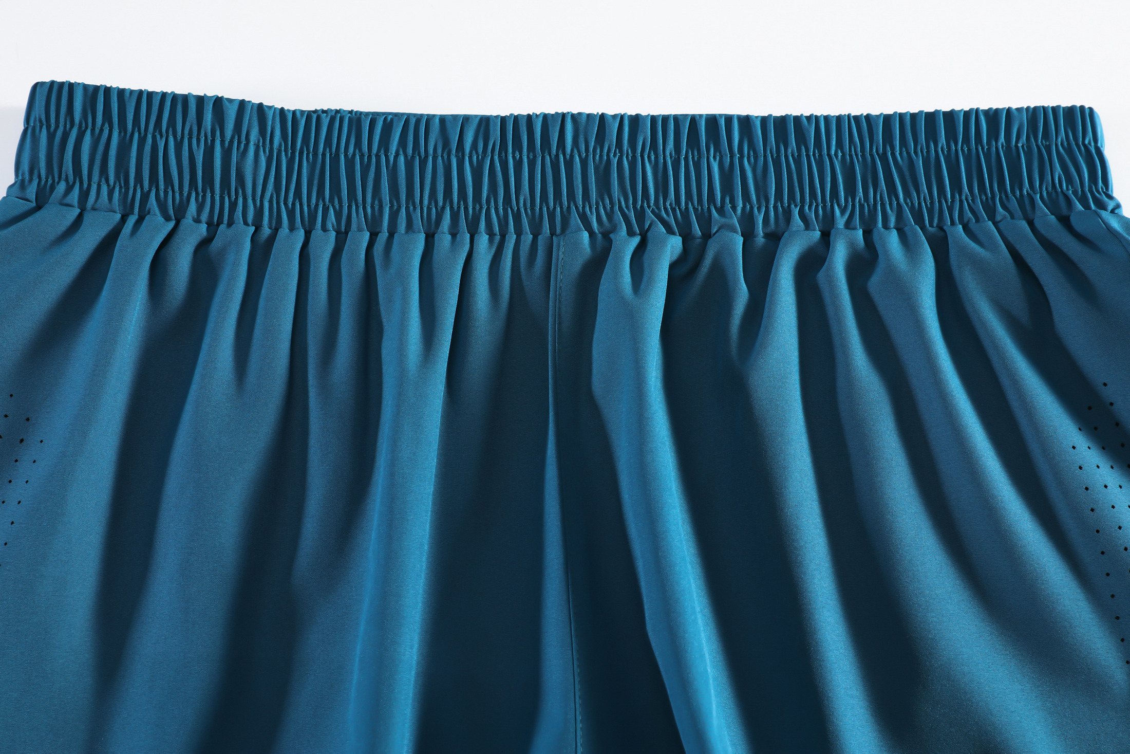 Bonded waistband and rear-pocket construction