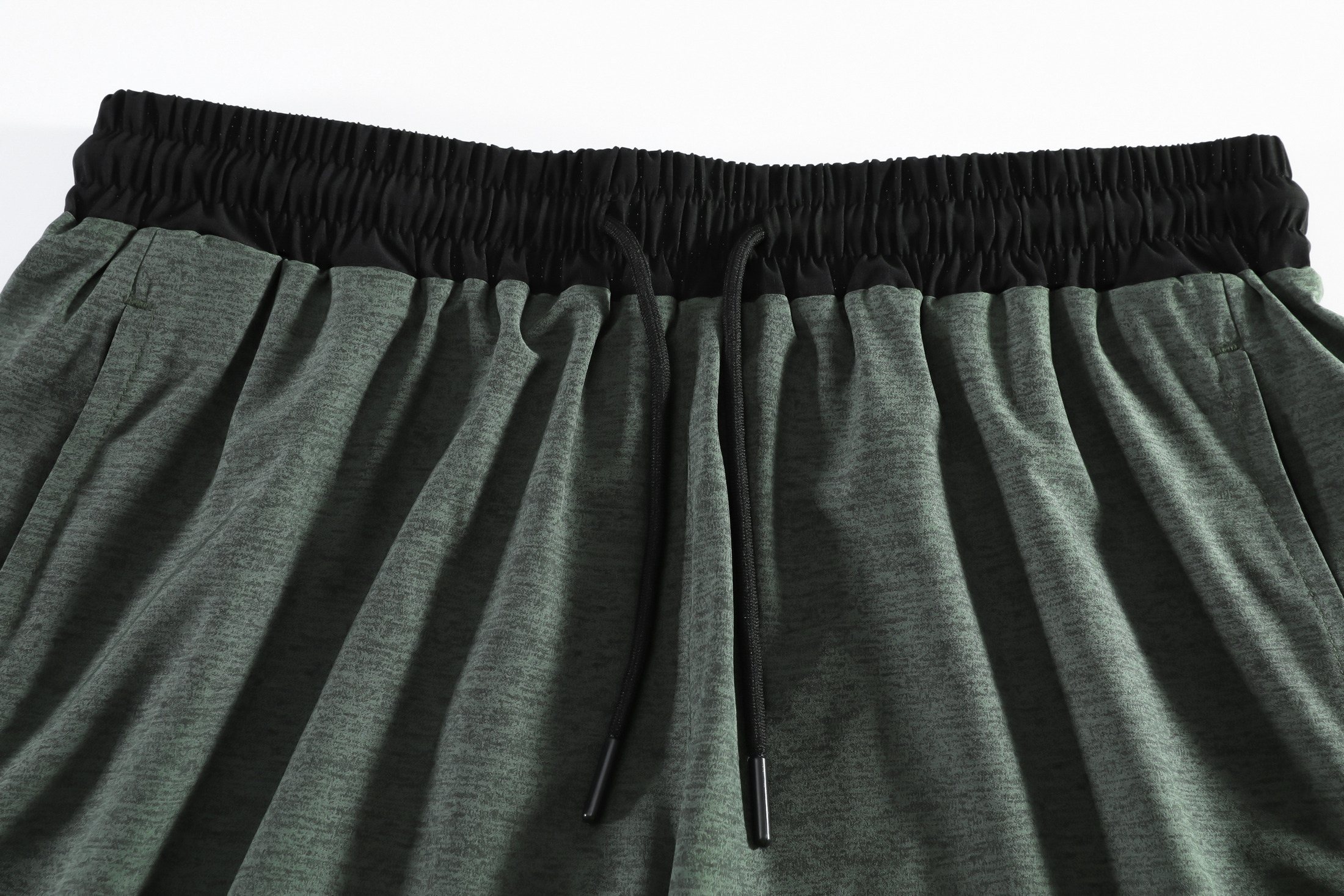 Drawcord waistband and multi-pocket construction