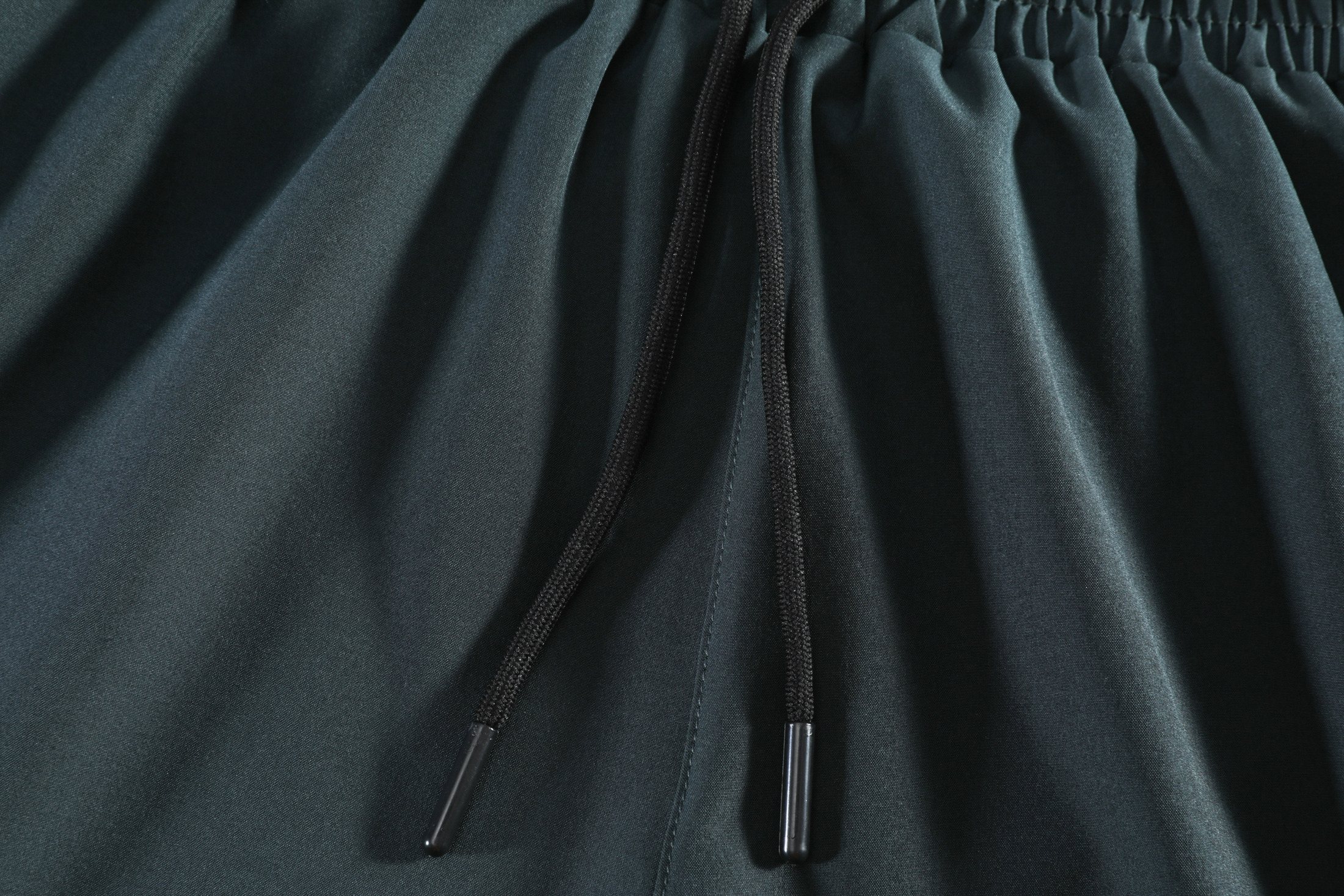 Stretch-woven outer and substantial inner liner
