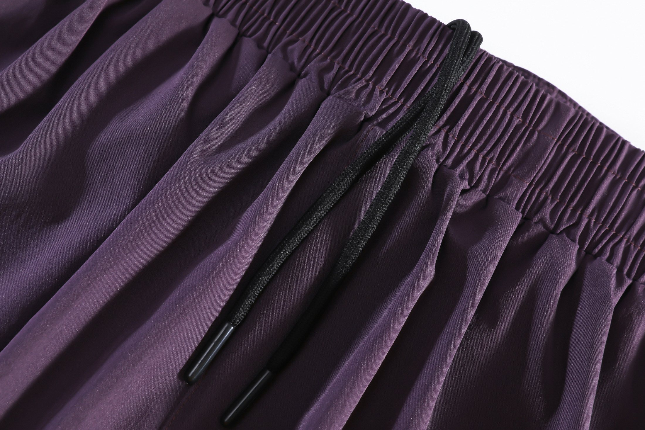 High-stretch nylon outer with selectable liner weight
