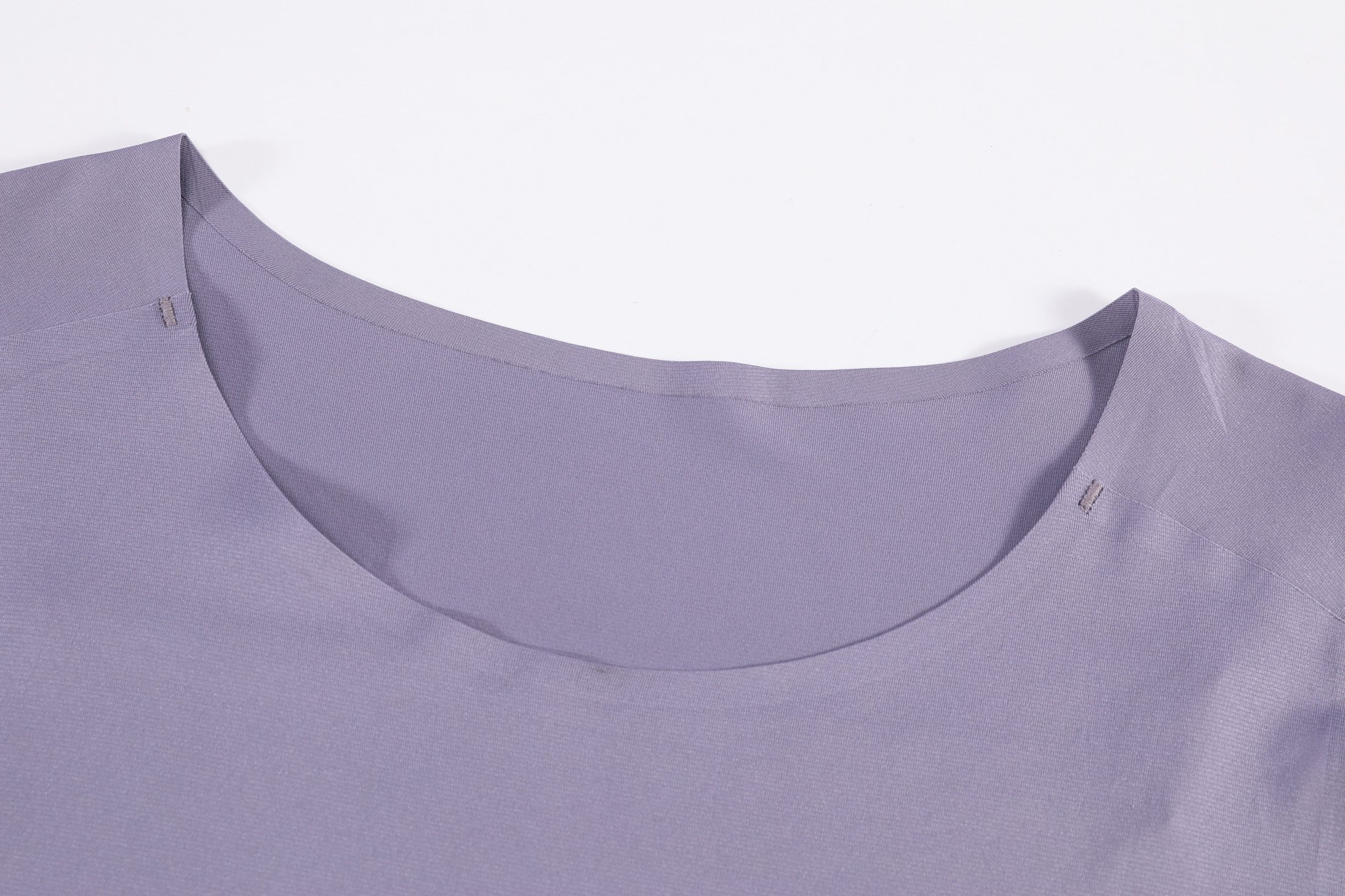 Seamless bonded neckline and shoulder construction