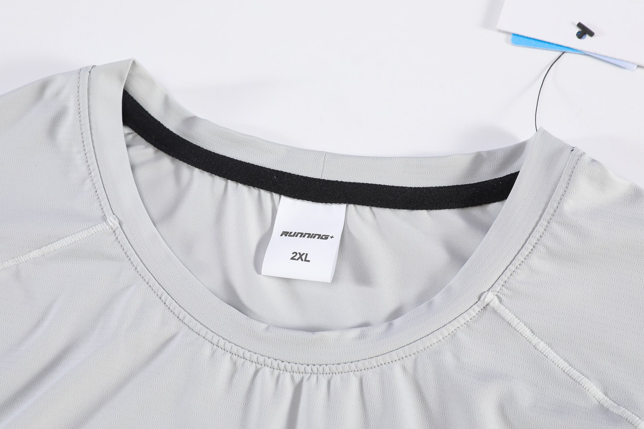 Wide-shoulder neckline and clean armhole construction