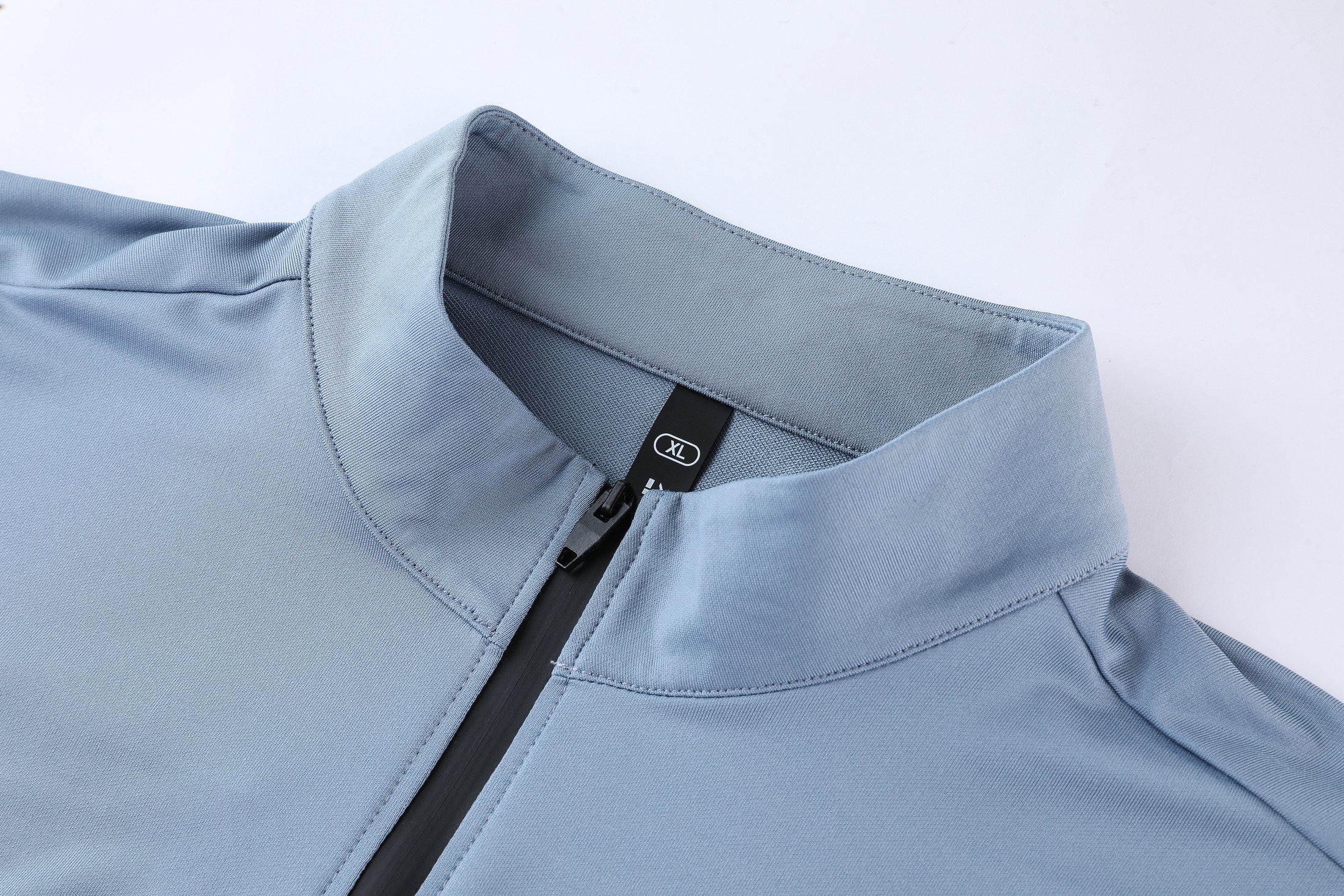 Crew neckline and long-sleeve shoulder construction