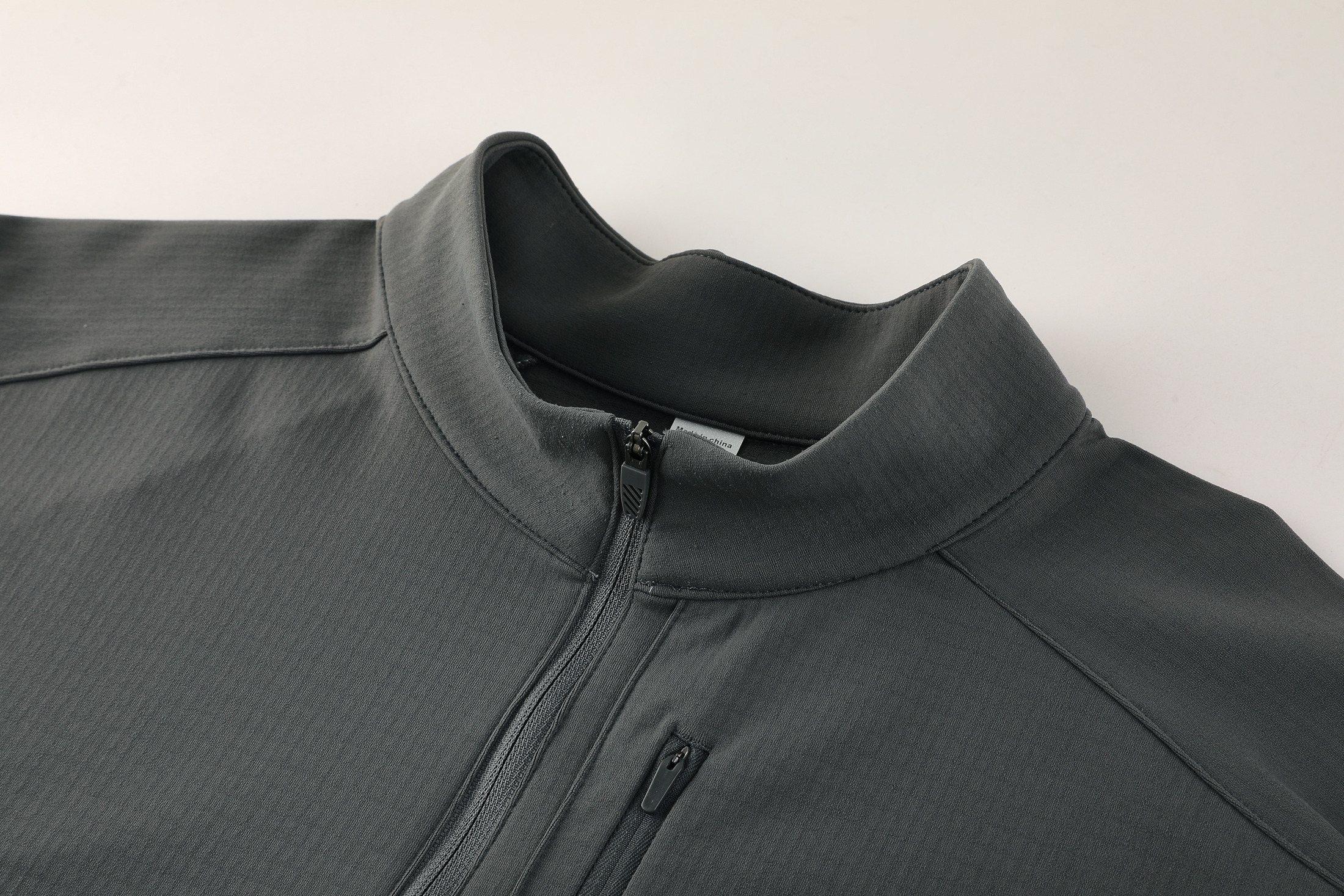 Quarter-zip collar and chest pocket
