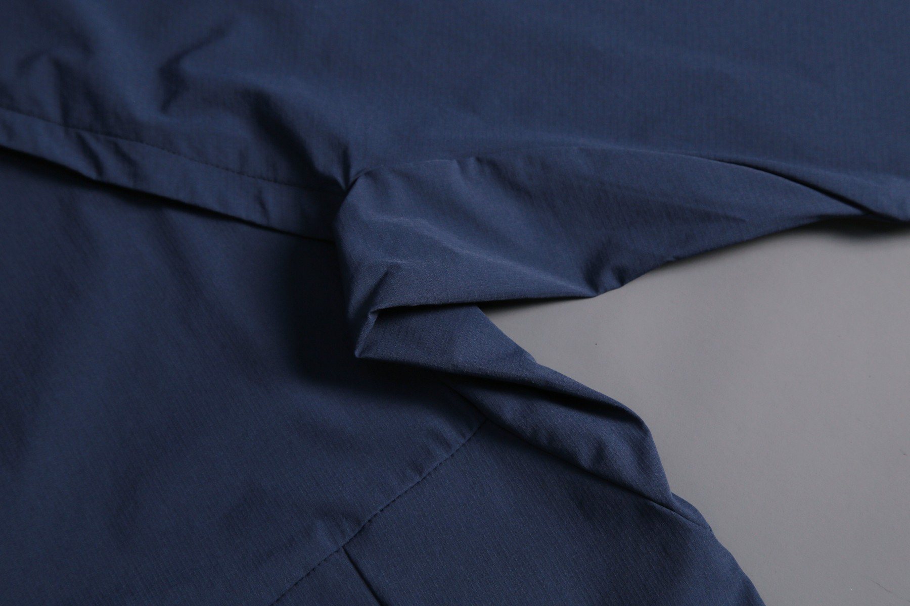 Cuff, side seam, and hem finishing